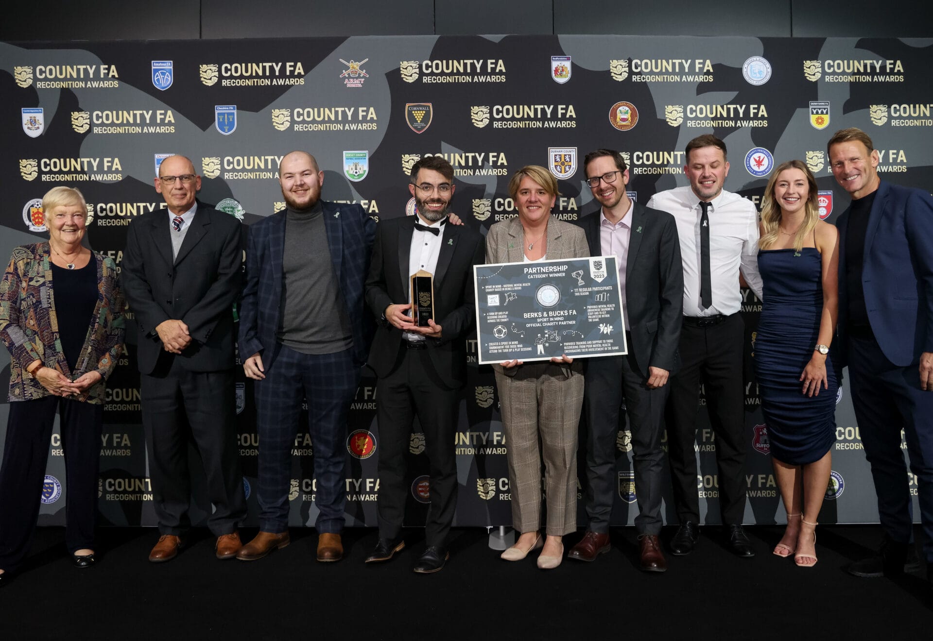 Pictured at the Awards are Sue Hough MBE, John Horsley BBFA director, BBFA staff Hans Cook, Rod Noble, Liz Verrall, Alastair Kay, Richard Brant, Kelly Sutton and Teddy Sheringham. Credit: Getty Images / Berks & Bucks FA.